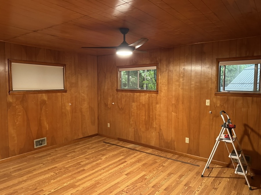 Room refresh: new flooring, ceiling fan, and blinds, after