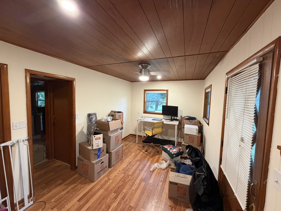 Room makeover: painted walls, new flooring, and ceiling fan, after